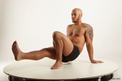 Underwear Man Black Sitting poses - simple Muscular Bald Sitting poses - ALL Academic